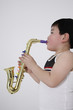 Boy playing saxophone