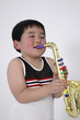 Boy playing saxophone