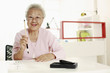 Foto: Senior woman writing calligraphy Senior woman writing calligraphy