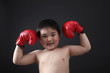 Foto: Boy with boxing gloves Boy with boxing gloves