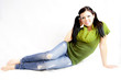 Woman in Green Sweater and Jeans