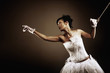 Woman puppet trying to break loose from tied string