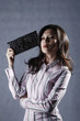 Woman posing with handbag
