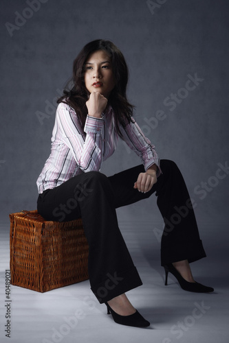 Photo: Woman looking away, contemplating Woman looking away, contemplating
