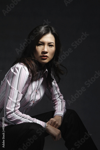 Photo: Woman posing for the camera Woman posing for the camera