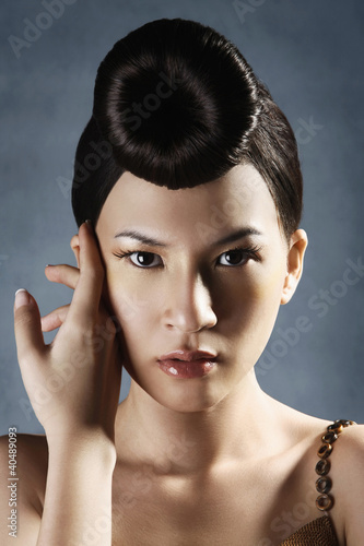Photo: Woman posing in evening dress Woman posing in evening dress