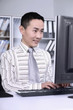 Foto: Businessman working on computer Businessman working on computer