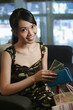 Woman counting money in her wallet