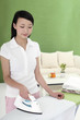 Woman ironing clothes