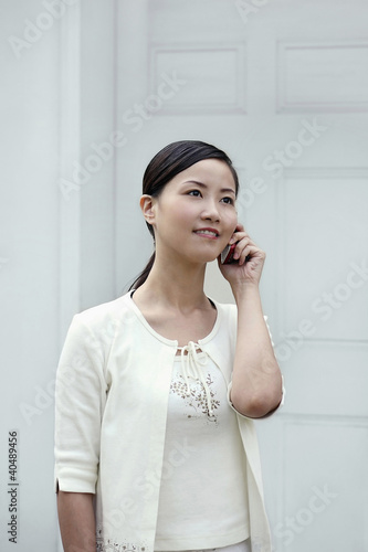Photo: Woman talking on the phone Woman talking on the phone