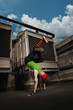 Young woman breakdancing