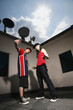 Young man and woman posing for the camera