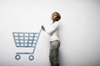 Woman pushing shopping cart symbol