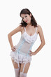 Foto: Woman in mesh and lace underwire cup chemise Woman in mesh and lace underwire cup chemise