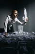 Businesswoman looking at opened crumpled paper