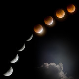 total lunar eclipse at dark night with cloud - Fine Art prints