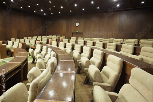 Photo: Rows of armchairs in the meeting room. Rows of armchairs in the meeting room.