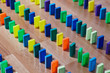 Several rows of colored plastic knuckles.