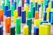 Several rows of plastic colored knuckles that stands vertically