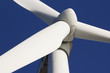 A wind-turbine against a clear blue sky