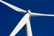 A wind-turbine against a clear blue sky A wind-turbine against a clear blue sky