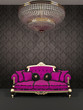Red sofa and chandelier in royal interior