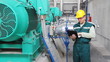 Industrial worker with notebook