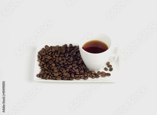 Photo: Cup of coffee isolated on white Cup of coffee isolated on white