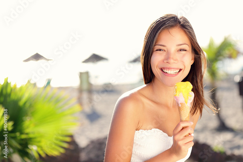 Photo: Woman eating ice cream Woman eating ice cream
