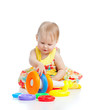 Photo: smiling little girl playing with color toy smiling little girl playing with color toy