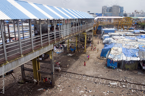 Photo: Slum near railway in Mumbai, India Slum near railway in Mumbai, India