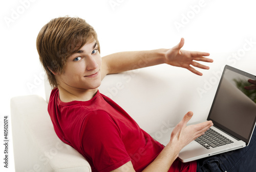 Photo: Young man with a laptop Young man with a laptop