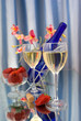 Photo: Two glasses of wine with red strawberries and orchid Two glasses of wine with red strawberries and orchid