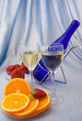 Photo: Two glasses of wine with oranges and strawberry Two glasses of wine with oranges and strawberry