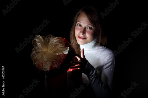 Illustration: Young woman reading a magic book Young woman reading a magic book