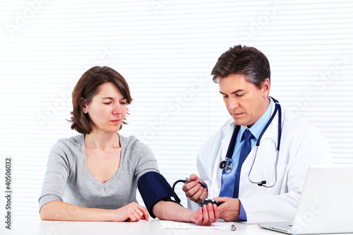 Photo: Doctor and patient woman. Doctor and patient woman.