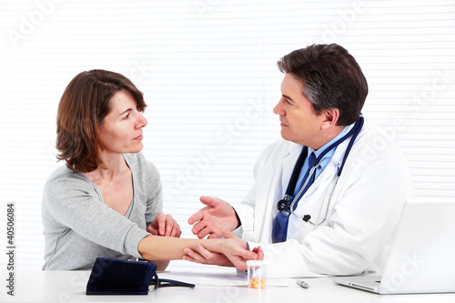 Photo: Doctor and patient woman. Doctor and patient woman.