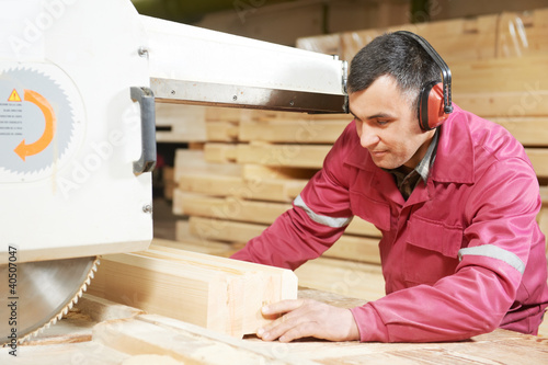 Photo: closeup carpentry wood cross cutting closeup carpentry wood cross cutting