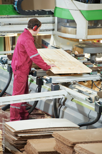 Photo: closeup carpentry wood cross cutting closeup carpentry wood cross cutting