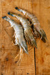 giant tiger raw shrimps prawns  on wood case, macro