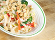 Thai Rice Noodle Salad in a bowl sitting on a table