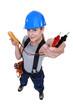 female electrician holding a measurement tool