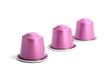 violet coffee capsules isolated on a white violet coffee capsules isolated on a white