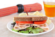Healthy turkey sandwich on whole wheat bread.