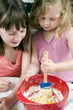 Kids learning baking