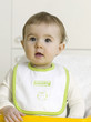 Baby girl wearing bib