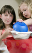 Kids learning baking