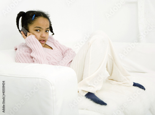 Photo: Girl talking on the phone Girl talking on the phone