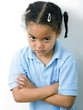 Girl folding her arms while staring at the camera