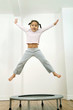 Kid jumping happily